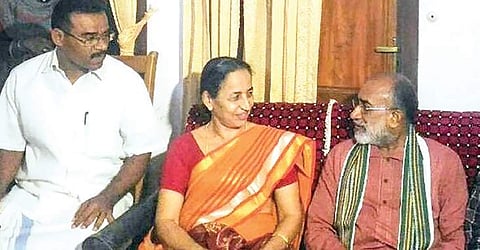 Union Minister Alphons Kannanthanam calls on P V Pushpaja, the principal of Nehru Arts and Science College, at her house at Kodakkad near Cheemeni