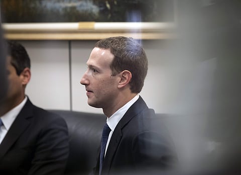 Facebook CEO Mark Zuckerberg sits in a waiting room before meeting with Sen. Bill Nelson, the ranking member of the Senate Commerce Committee, Capitol Hill in Washington | AP