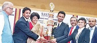 CJ Indira Banerjee handing over the winners trophy to students of Nirma University, Ahmedabad | Express