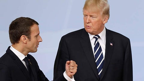 Donald Trump and Emmanuel Macron (FILE | AP)