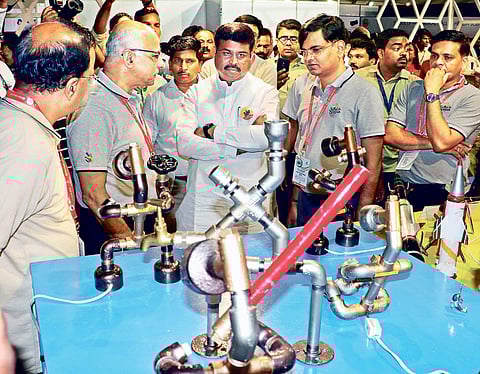 Union Minister Dharmendra Pradhan with Odisha Skill Development Authority Chairman Subroto Bagchi and Secretary Sanjay Singh at the State level finals of Odisha skills 2018 in Bhubaneswar on Monday | Express