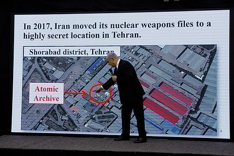 Israeli Prime Minister Benjamin Netanyahu presents material on Iranian nuclear weapons development during a press conference in Tel Aviv, Monday, April 30 2018. | AP