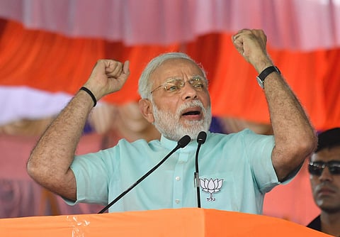 Prime Minister Narendra Modi speaks during Karnataka election campaign rally at Chamarajanagar on Tuesday, 01 May 2018. | PTI