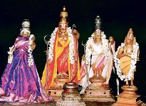 Where Srinivasa blesses with a sankha and a chakra