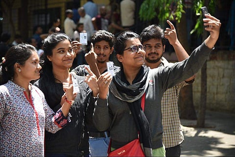 First time voters at Padamanabhanagar Governent school in Bengaluru. (EPS | Nagaraja Gadekal)