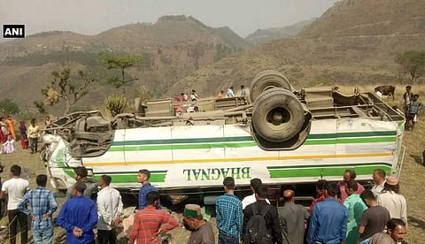 People gather near the accident site in Himachal. (ANI)