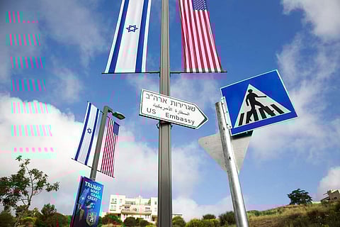 A road sign leading to the U.S. Embassy is seen ahead the official opening in Jerusalem. | AP