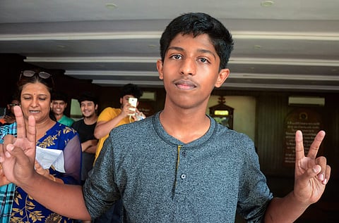 Swayam Das from St Mary's ICSE School Koparkhairane shows a victory sign after he topped in the Indian Certificate of Secondary Examination ICSE 10th class exams with a score of 99.4 in Navi Mumbai on Monday. | PTI
