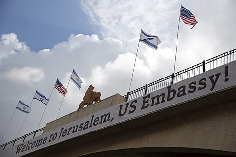 A sign on a bridge leading to the US Embassy compound ahead the official opening in Jerusalem, Sunday, May 13, 2018. (Photo | AP)