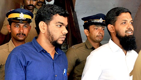 Muhammed asif and Abdul Sathar being taken to Viyyoor central prison after NIA court in Kochi announced verdict in Vagamon Simi camp case. (Express Photo | A Sanesh)