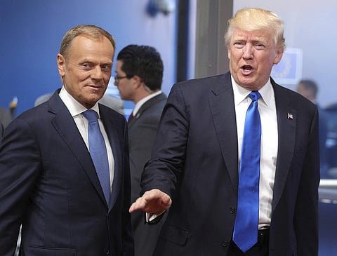 US President Donald Trump speaks with European Council President Donald Tusk in Brussels. | AP