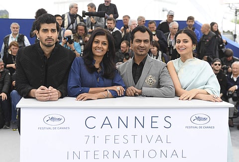 Actor Tahir Raj Bhasin, from left, director Nandita Das, actor Nawazuddin Siddiqui and Rasika Dugal pose for photographers during a photo call for the film 'Manto' at the 71st international film festival, Cannes. (Photo: AP)