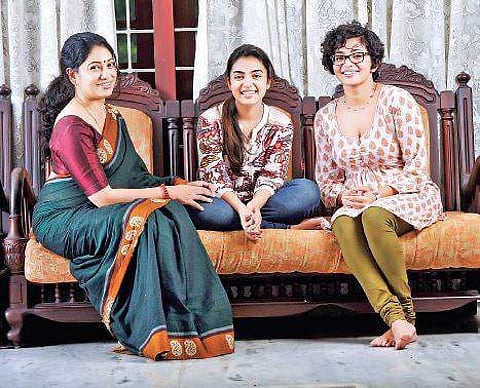Anjali Menon with Nazariya and Parvathy.