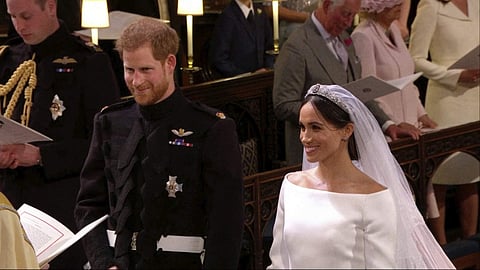Prince Harry and Meghan Markle at the St. George's Chapel during the wedding ceremony | AP