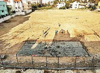 Kids enjoy a game of cricket at the HR & CE land in Selaiyur | Express