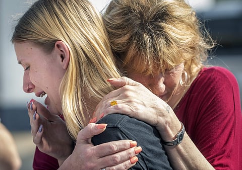 Santa Fe High School student Dakota Shrader is comforted by her mother Susan Davidson following a shooting at the school on Friday, May 18, 2018, in Santa Fe, Texas. (Photo | AP)