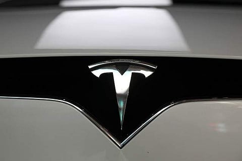 A Tesla logo is seen in Los Angeles. (Photo: Reuters)