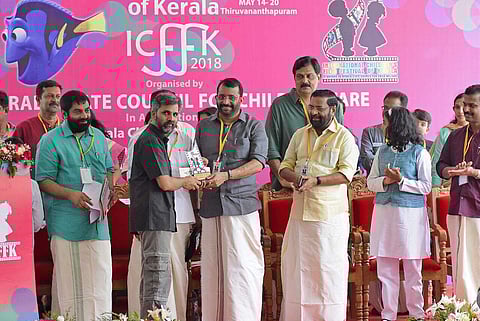 The New Indian Express, Thiruvananthapuram bureau, bags the award for 'Best Reporting' in English Daily category in the International Children's Film Festival of Kerala 2018. Anil S, Bureau Chief, receives the award from Speaker P Sreeramakrishnan as Ker