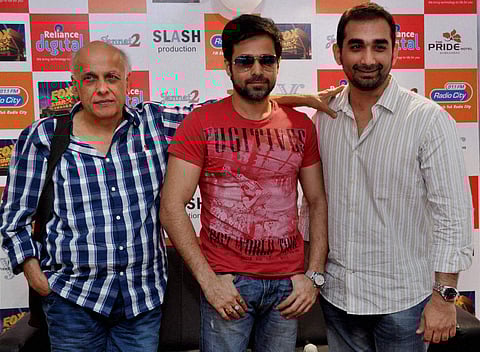 Filmmaker Mahesh Bhatt, actor Emraan Hashmi and Directer Kunal Deshmukh during a press conference for 'Jannat-2' in Ahmedabad, 28 April 2012. | PTI