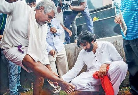 Jana Sena Party chief Pawan Kalyan interacts with farmers at Sompeta on Monday | Express