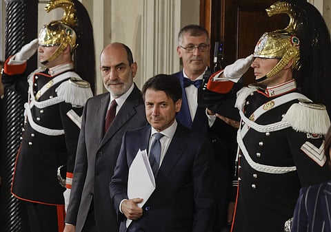 Giuseppe Conte arrives to address the media after meeting Italian President Sergio Mattarella, at the Quirinale presidential palace in Rome, Wednesday, May 23, 2018. | AP