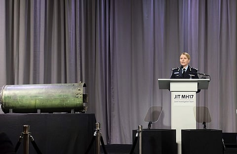 Australian Federal Police Commander Jennifer Hurst speaks as she stands near to part of a Buk missile recovered from the site of the MH17 crash, during a press conference regarding the downing of the Malaysia Airlines Flight 17, in Bunnik, Central Netherl