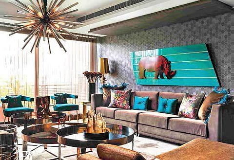 The living room with an artwork called Marching Ahead