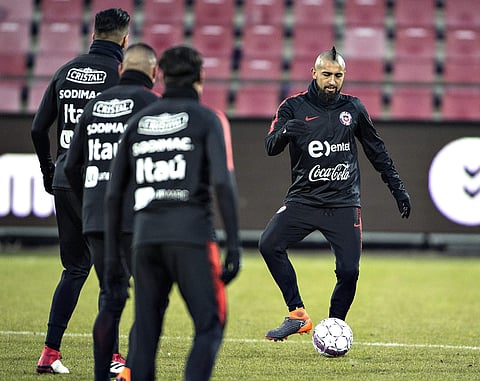 Chile's Arturo Vidal controls the ball, during a training session at the Aalborg Portland Arena, in Aalborg, Denmark, Monday, March 26, 2018. | AP File Photo
