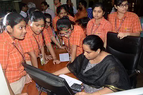 CBSE class 12 students check their results. (EPS)