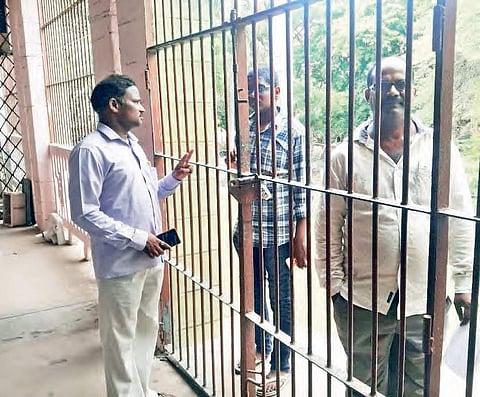 A harried student waits outside during EAMCET counselling session at SRR College in Vijayawada on Monday | express