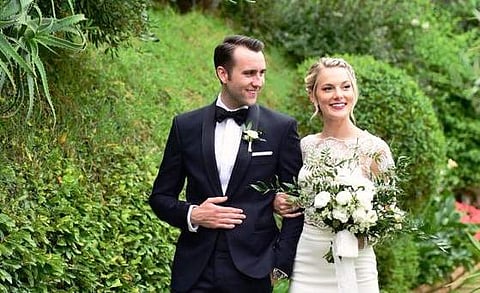 Matthew Lewis with newly wedded wife Angela Jones. (Twitter: @Mattdavelewis)