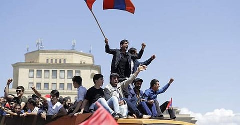 Opposition protesters block Armenia's main airport road. | AP