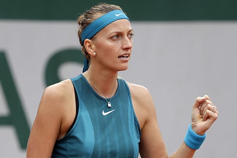 Petra Kvitova of the Czech Republic reacts as she plays Spain's Lara Arruabarrena during their second round match of the French Open tennis tournament at the Roland Garros stadium, Wednesday, May 30, 2018 in Paris. | AP