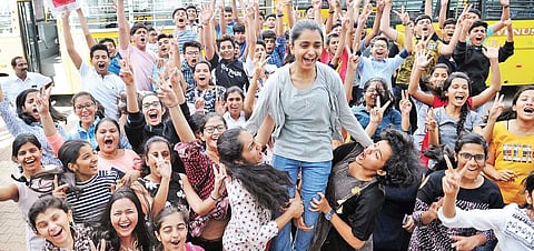 Students celebrate their success in CBSE Class 10 examinations after the declaration of results in Bengaluru on Tuesday | Express