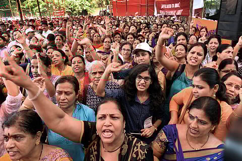 Mumbai Bank employees hold a demonstration as part of their two-day nationwide strike to press for wage revision in Mumbai on Wednesday. | PTI