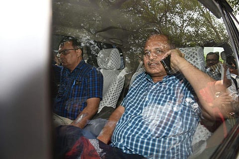Satyender Kumar Jain during the CBI raid at his residence near Rajniwas in New Delhi on Wednesday. (EPS | Parveen Negi)
