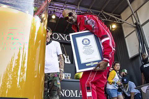 noop Dogg poses after breaking a Guinness World Records for the largest paradise cocktail at the Williams Sonoma Culinary stage at the Bottle Rock Napa Valley Music Festival at Napa Valley Expo. (AP)