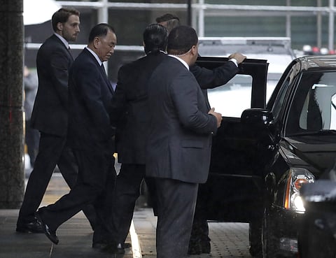 Kim Yong Chol, second from left, North Korea's former military intelligence chief and a close aid to leader Kim Jong Un, walks out of a building after meeting with U.S. Secretary of State Mike Pompeo | AP