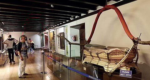A tourist looks at one of the exhibits at Mattanchery Museum | MELTON ANTONY