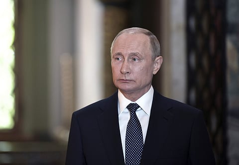 Russian President Vladimir Putin attends a service held by Russian Orthodox Patriarch Krill in the Annunciation Cathedral after the inauguration ceremony | AP