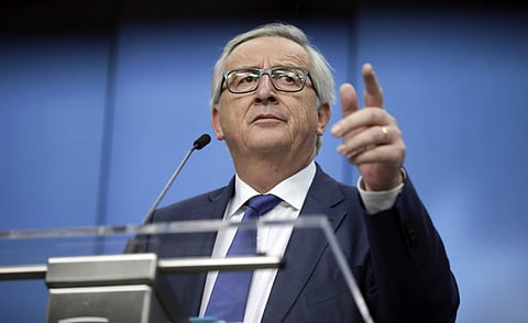 European Commission President Jean-Claude Juncker speaks during a media conference at the conclusion of an EU summit in Brussels on Friday, March 23, 2018. | AP