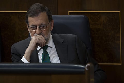 Spain's Prime Minister and Popular Party leader Mariano Rajoy listens to speeches during the first day of a motion of no confidence session at the Spanish parliament in Madrid, Thursday, May 31, 2018. | AP