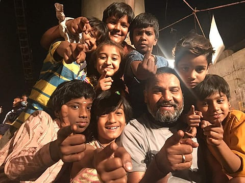 Nila Madhab Panda with the cast of 'Halkaa'. (Twitter Photo)