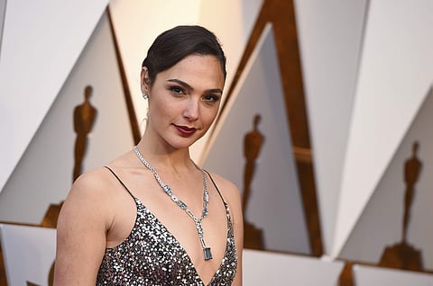 Gal Gadot arrives at the Oscars on Sunday, March 4, 2018, at the Dolby Theatre in Los Angeles. | AP