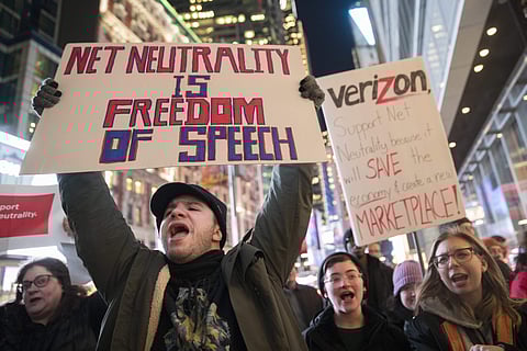 Demonstrators rally in support of net neutrality outside a Verizon store in New York. (AP)