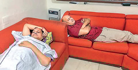 Delhi Deputy CM Manish Sisodia and Health Minister Satyendra Kumar Jain during their ongoing sit-in protest at L-G Anil Baijals residence, in New Delhi | PTI