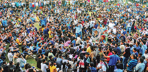 People sit on a silent protest demanding justice for Karbi Anglong lynching victims Abhijeet Nath and Nilotpal Das, in Guwahati | pti