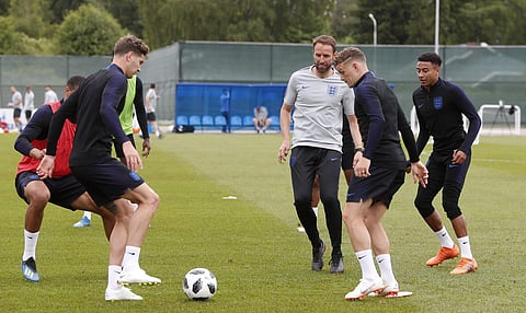 England head coach Gareth Southgate, centre, takes part in a training session for the England team at the 2018 soccer World Cup, in the Spartak Zelenogorsk stadium, Zelenogorsk near St. Petersburg, Russia, Wednesday, June 13, 2018. | AP