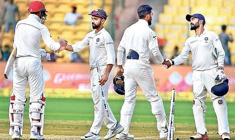 Players shake hands after the India-Afghanistan one-off Test at Chinnaswamy Stadium in Bengaluru on Friday. The match ended in two days | vinod kumar t
