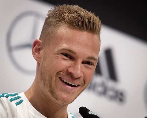German player Joshua Kimmich smlles during a press conference during the 2018 soccer World Cup in Vatutinki near Moscow. | AP